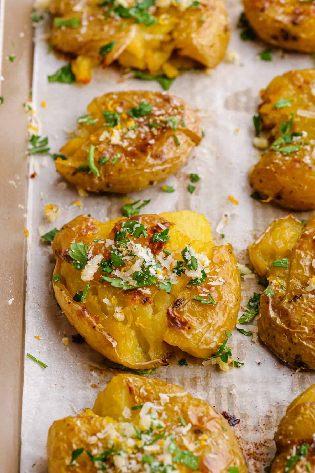 Roasted Smashed Potatoes with Garlic and Cheese (so easy!) - Texanerin ...