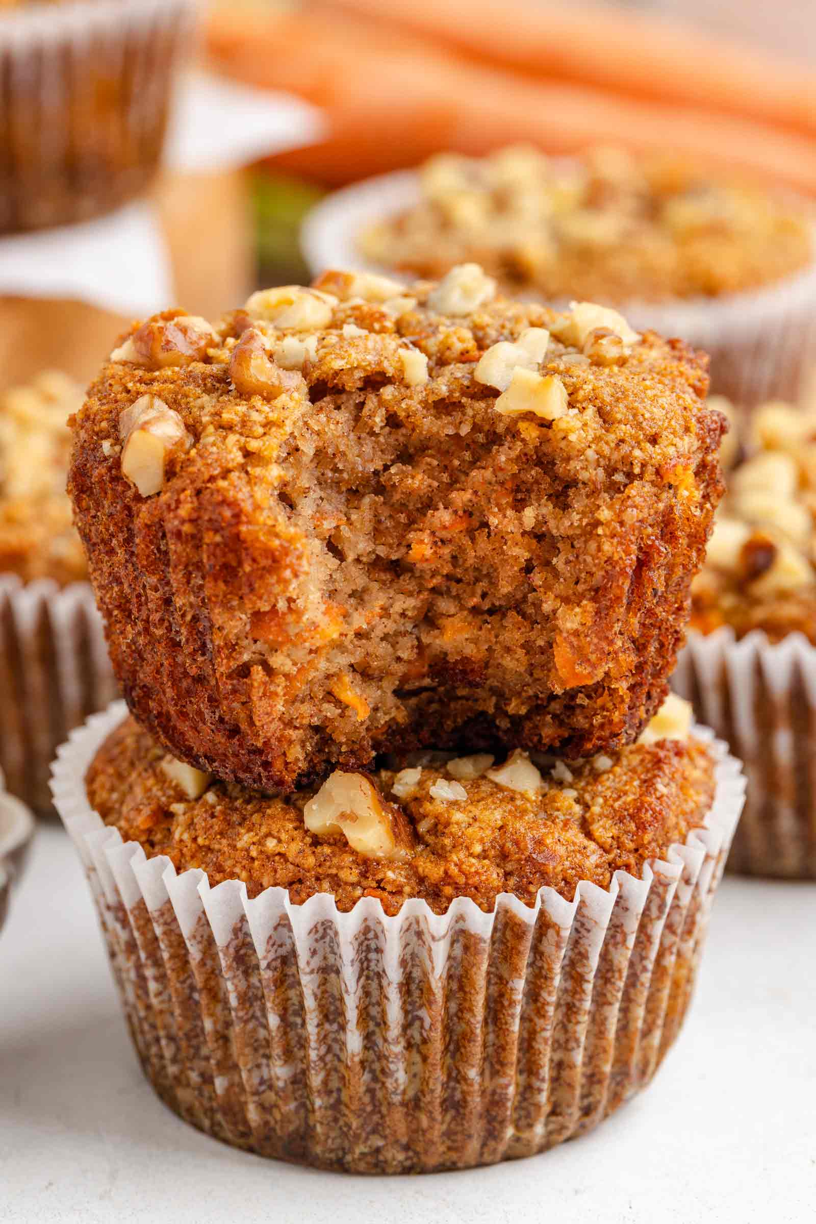 paleo carrot muffin with a bite taken out