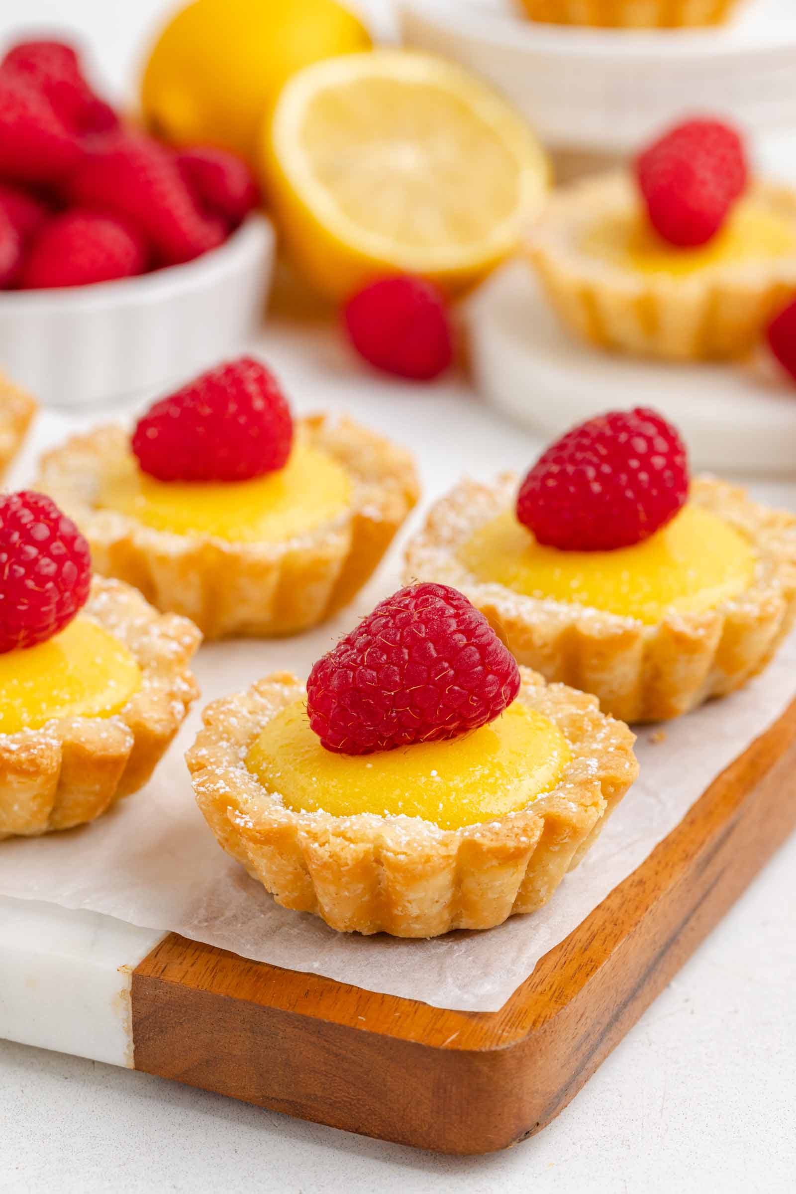 lemon tartlets on cutting board